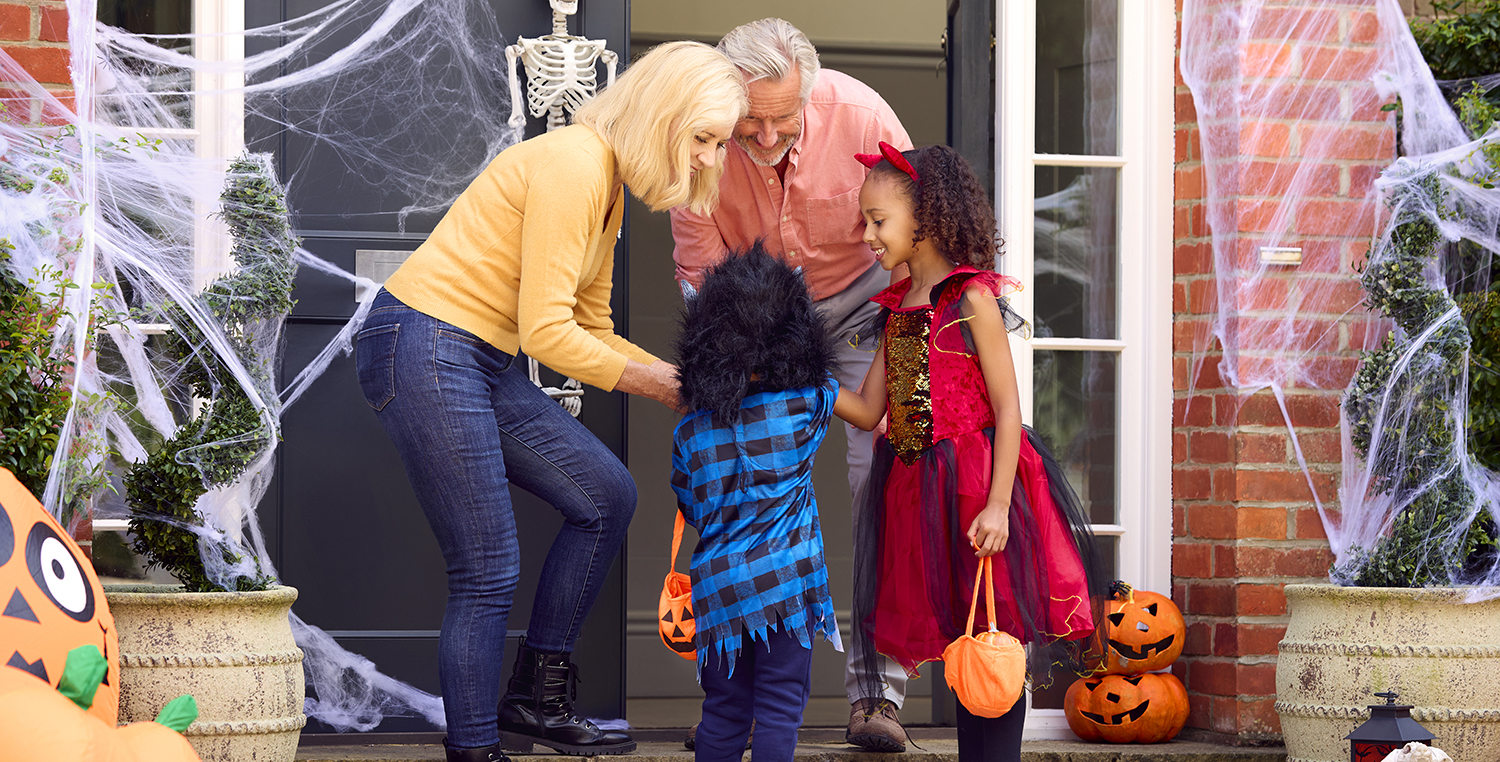 Grandchildren Dressing Up And Visiting Grandparent's House Trick