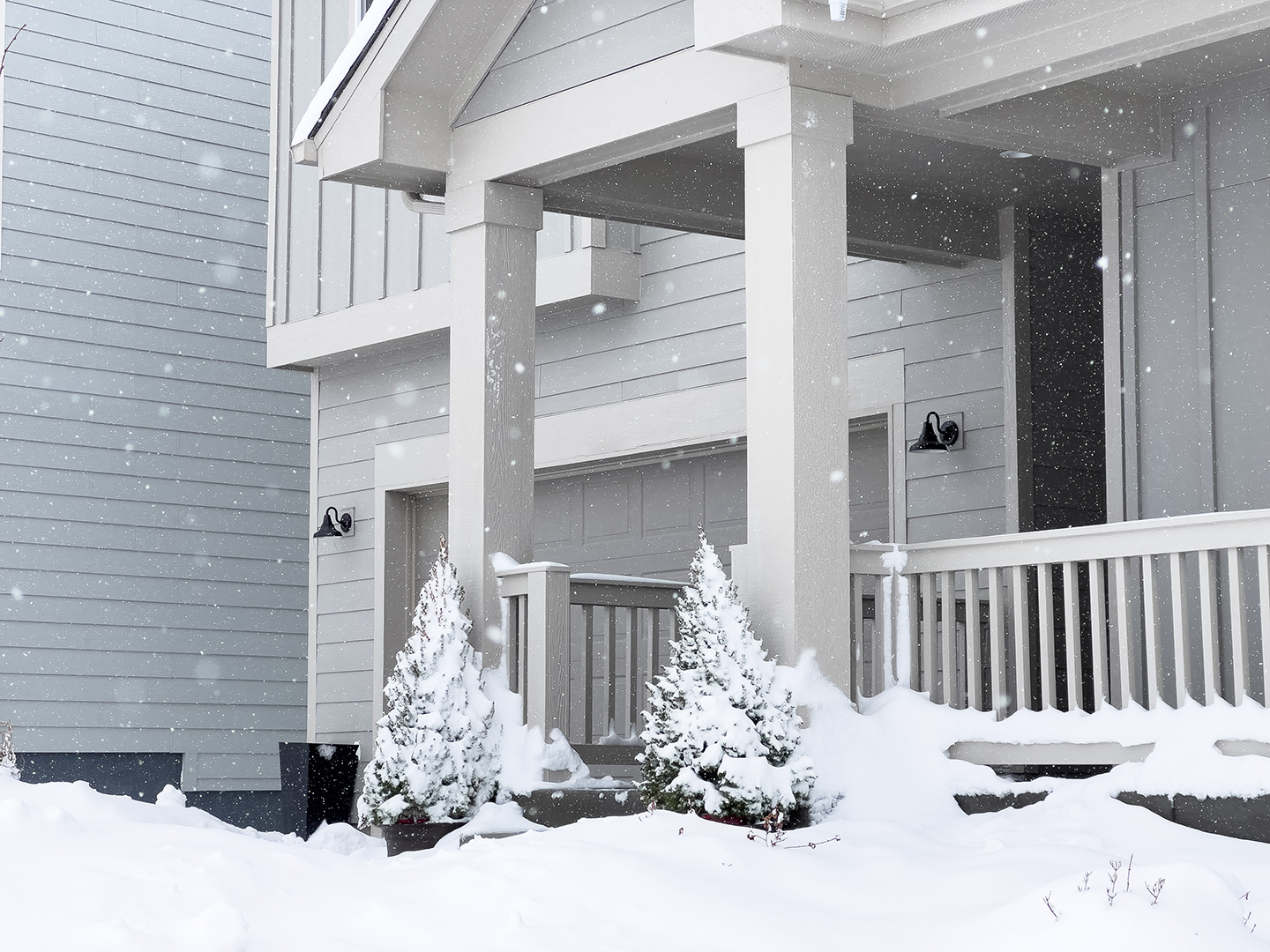 Winter’s Embrace: A Home’s Snow-Covered Entryway