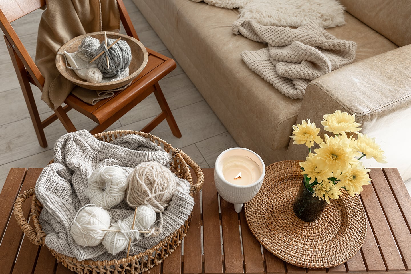 Threads for knitting in the interior of the room, a cozy composition with yarn.