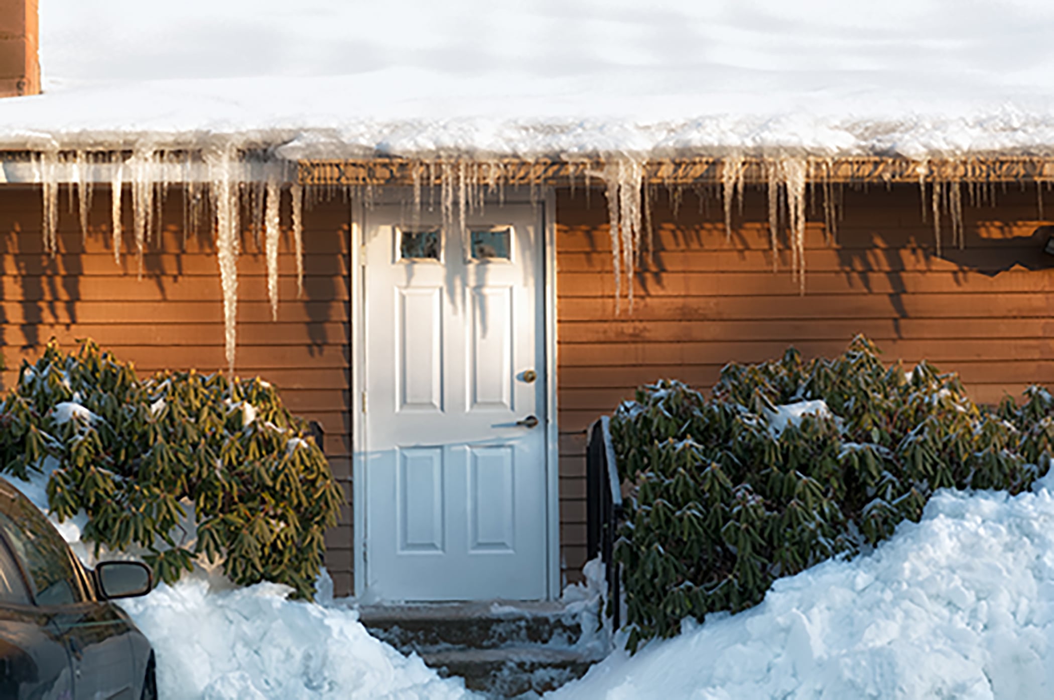 snow-covered-house-with-icicles-in-winter-sunlight-2026-09-22-21-49-24-utc