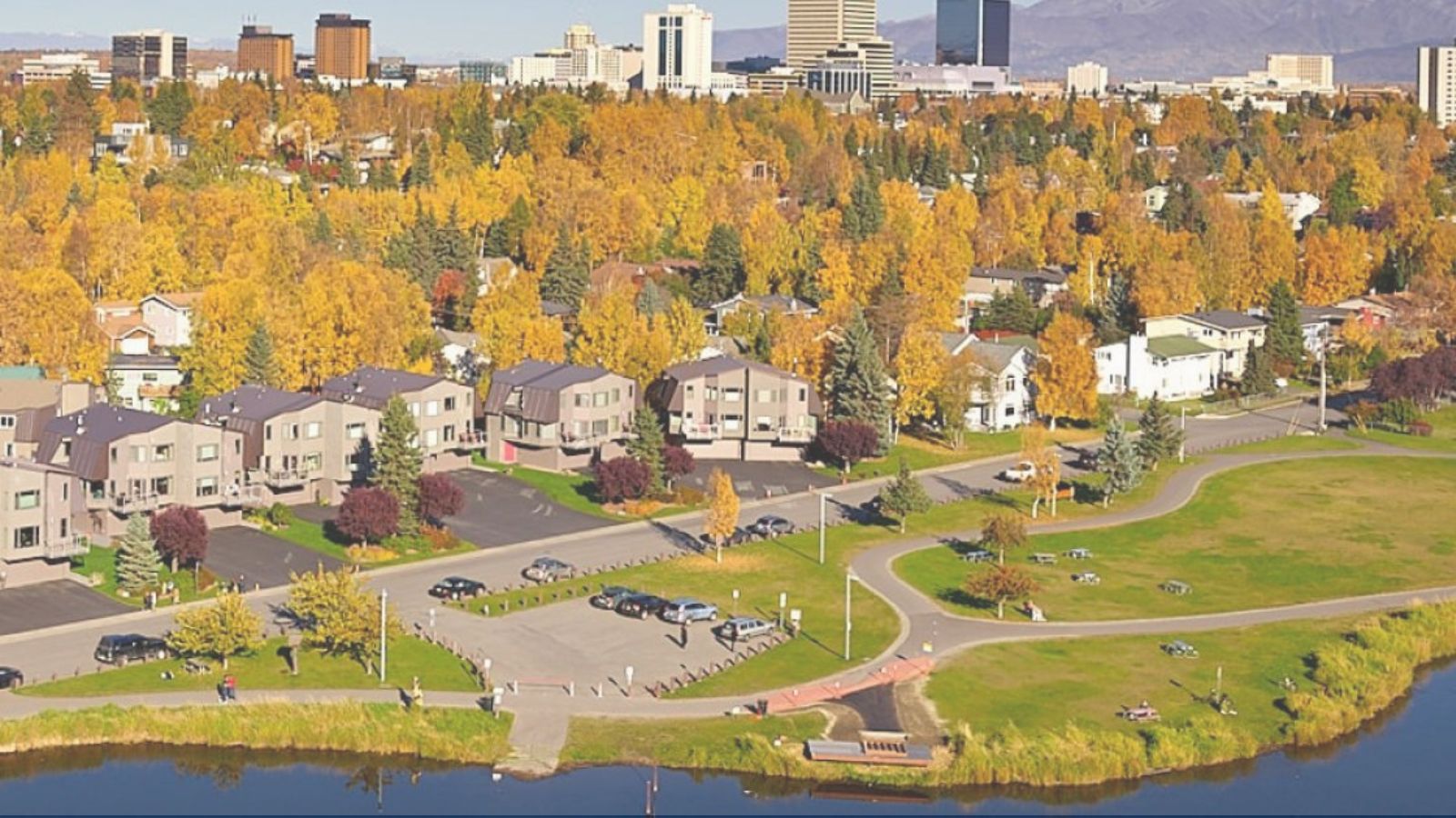 Aerial view of Westchester Lagoon, South Addition, and downtown Anchorage in fall