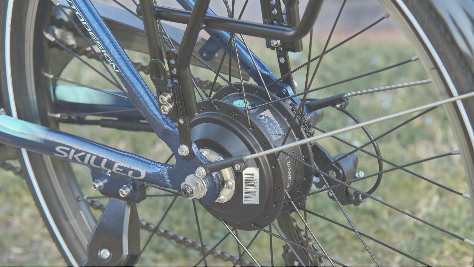 Close-up of a bicycle wheel and frame detail