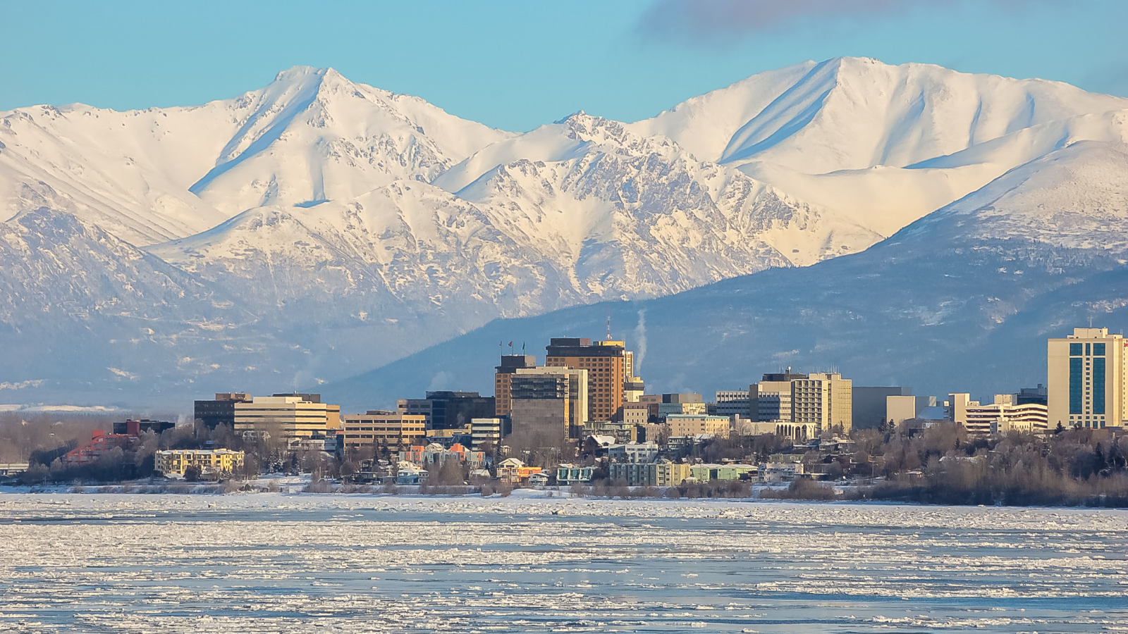 Moving to Moving to Anchorage Alaska with winter skyline and mountain views