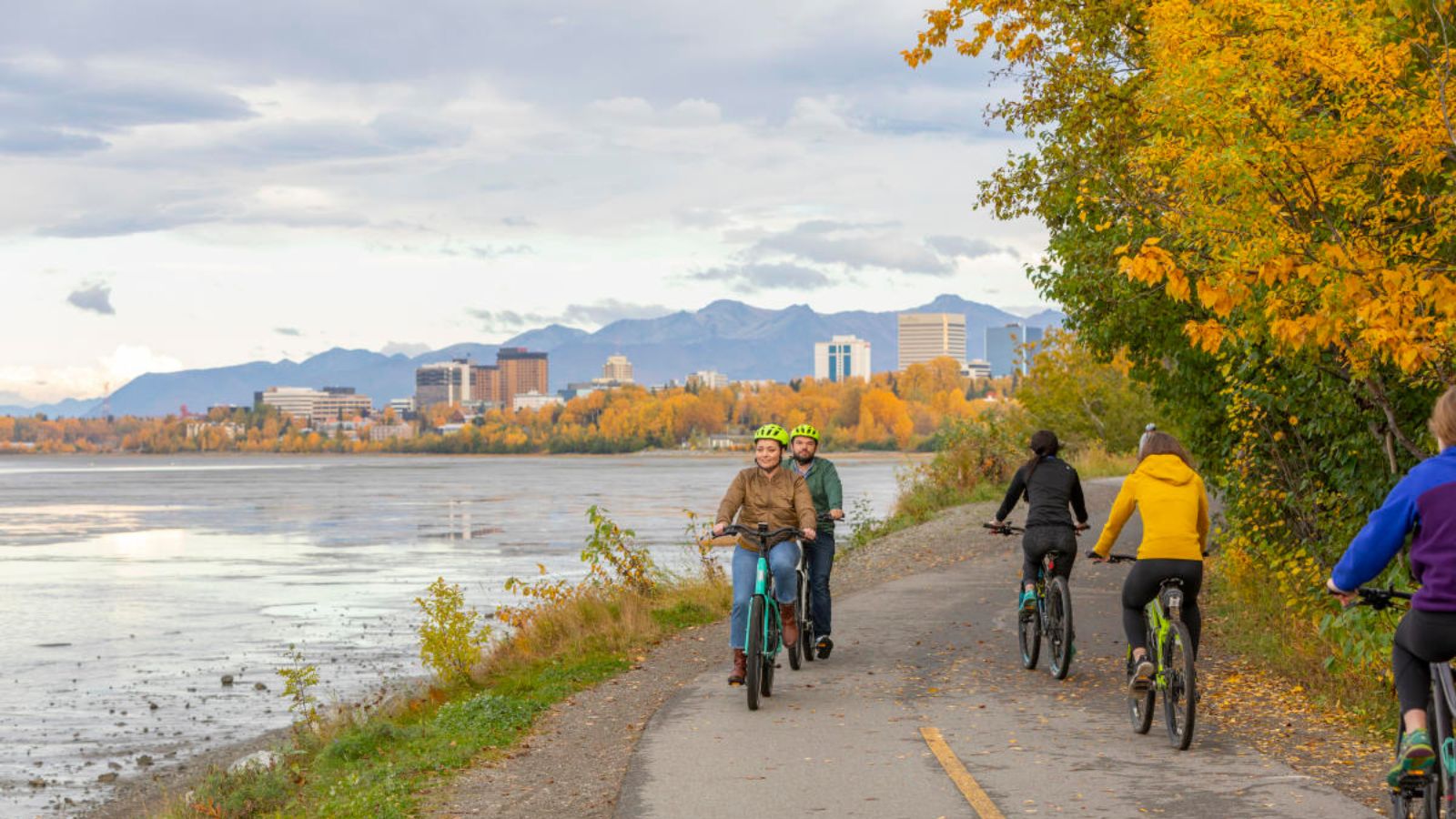 Cyclist riding near the Tony Knowles Coastal Trail in Anchorage Alaska