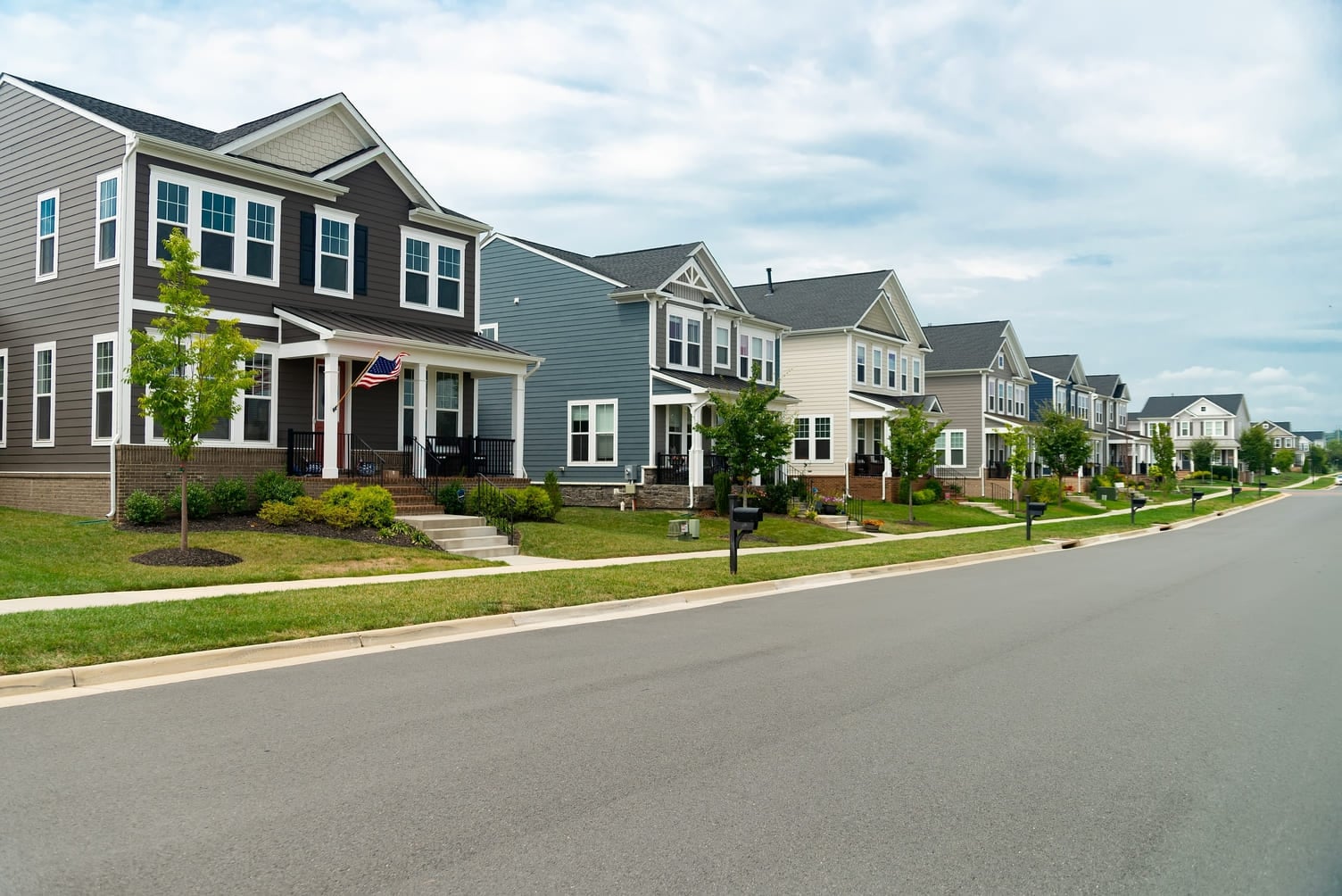 Row of Single Family Homes Along Road with Parking in Virginia