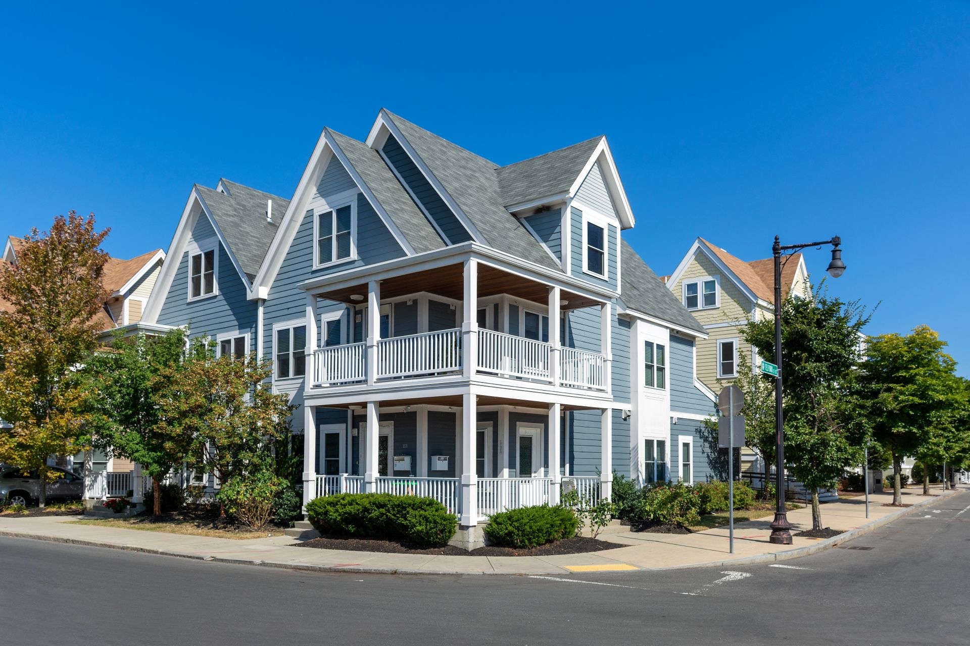 Charming two-story corner house with a classic New England architectural style in Brighton, Massachusetts, USA
