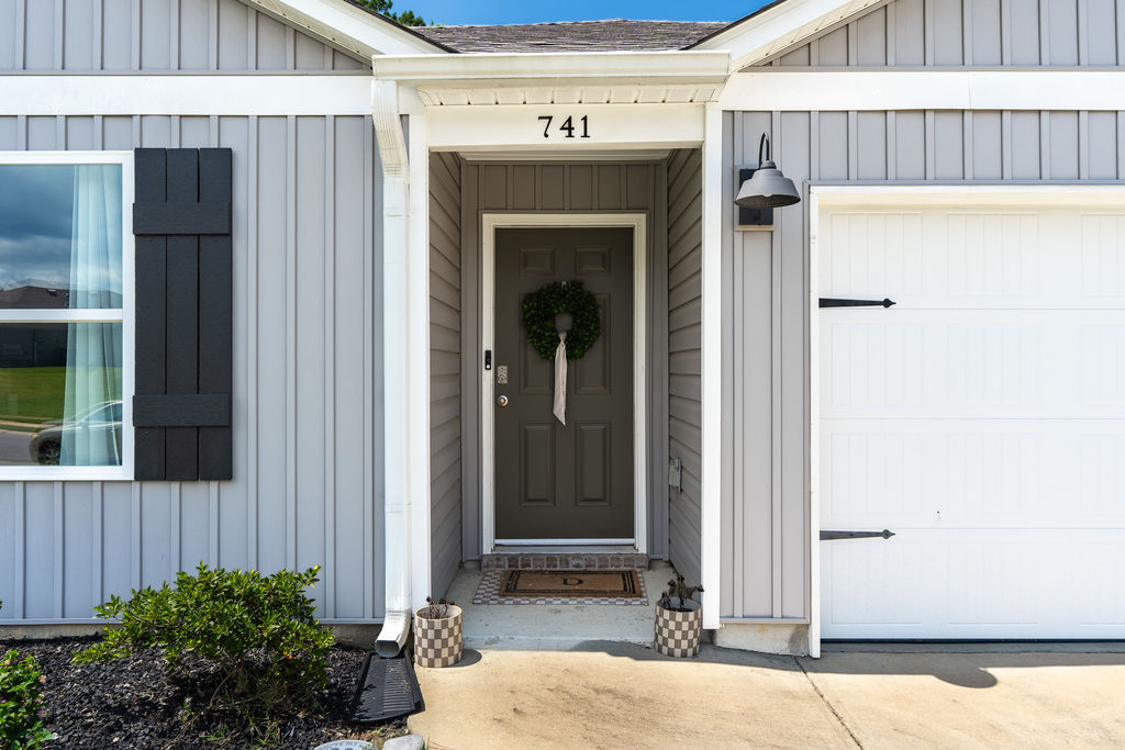 Front entry with keypad smart lock at 741 Fish Camp Road in Chelsea, AL