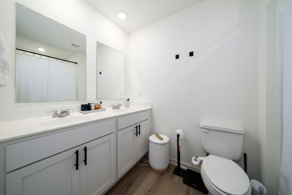 Primary bath with double vanity and dual mirrors at 741 Fish Camp Road, Chelsea, AL