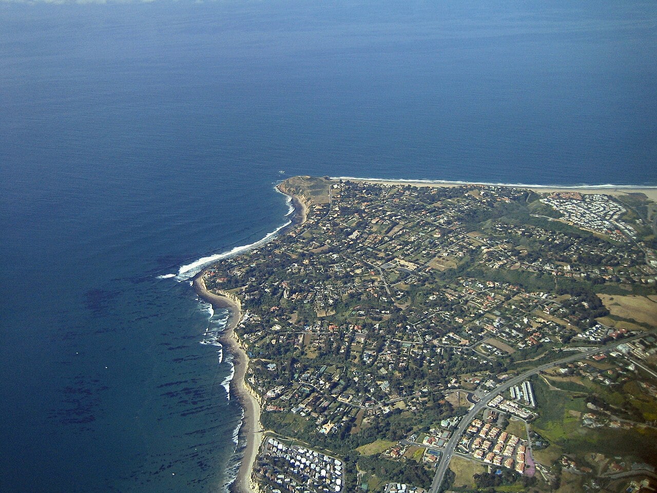 Aerial view of the Point Dume headland and neighborhood in Malibu, California