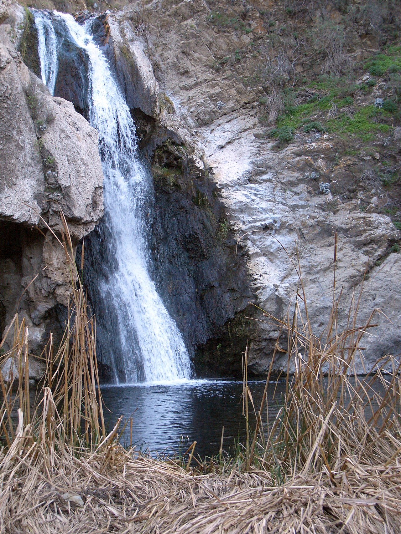 Paradise Falls waterfall pouring into its pond at Wildwood Park, Thousand Oaks