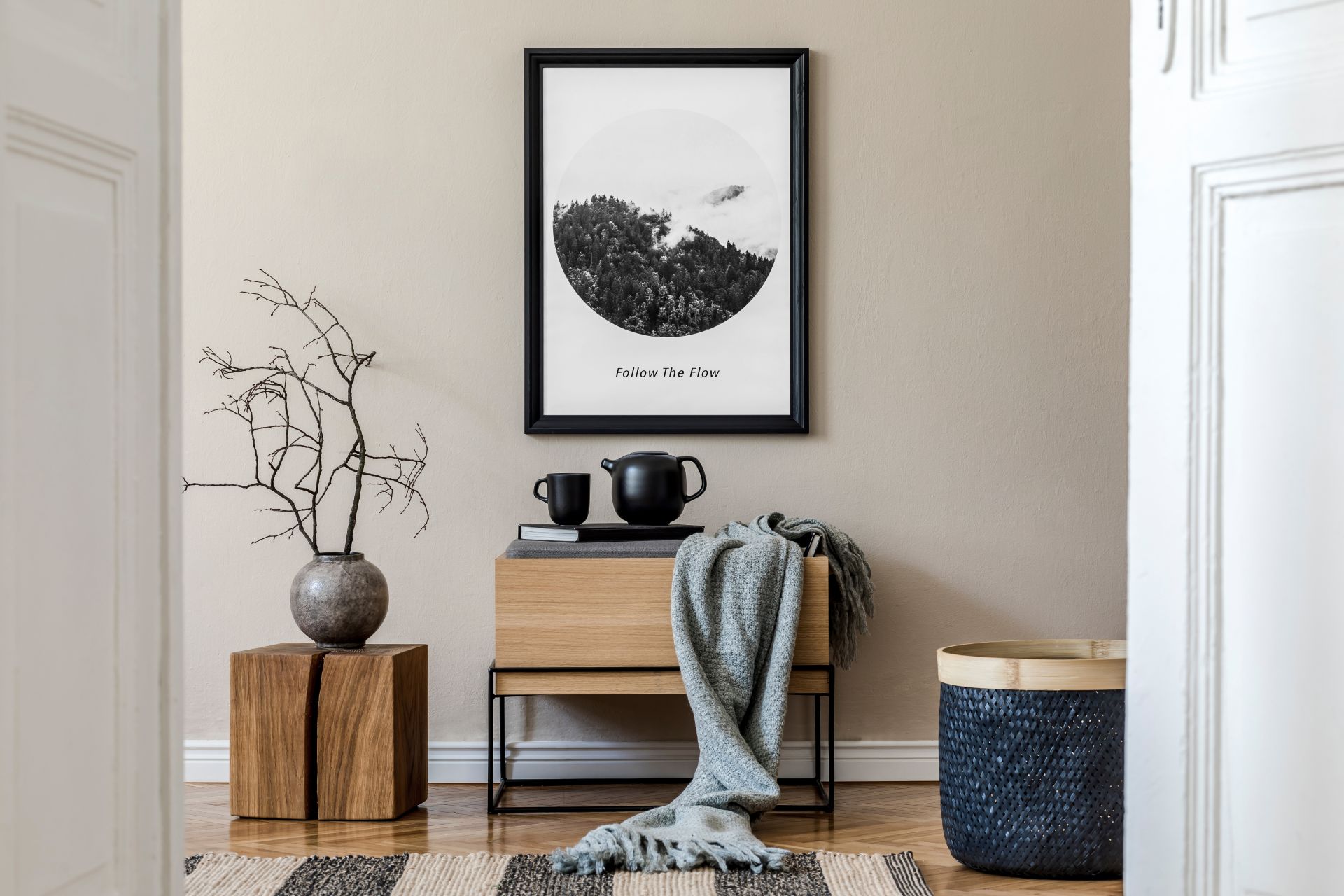 Modern scandinavian living room interior with black mock up poster frame, design commode, leaf in vase, black rattan basket, books and elegant accessories. Template. Stylish home decor. (1)