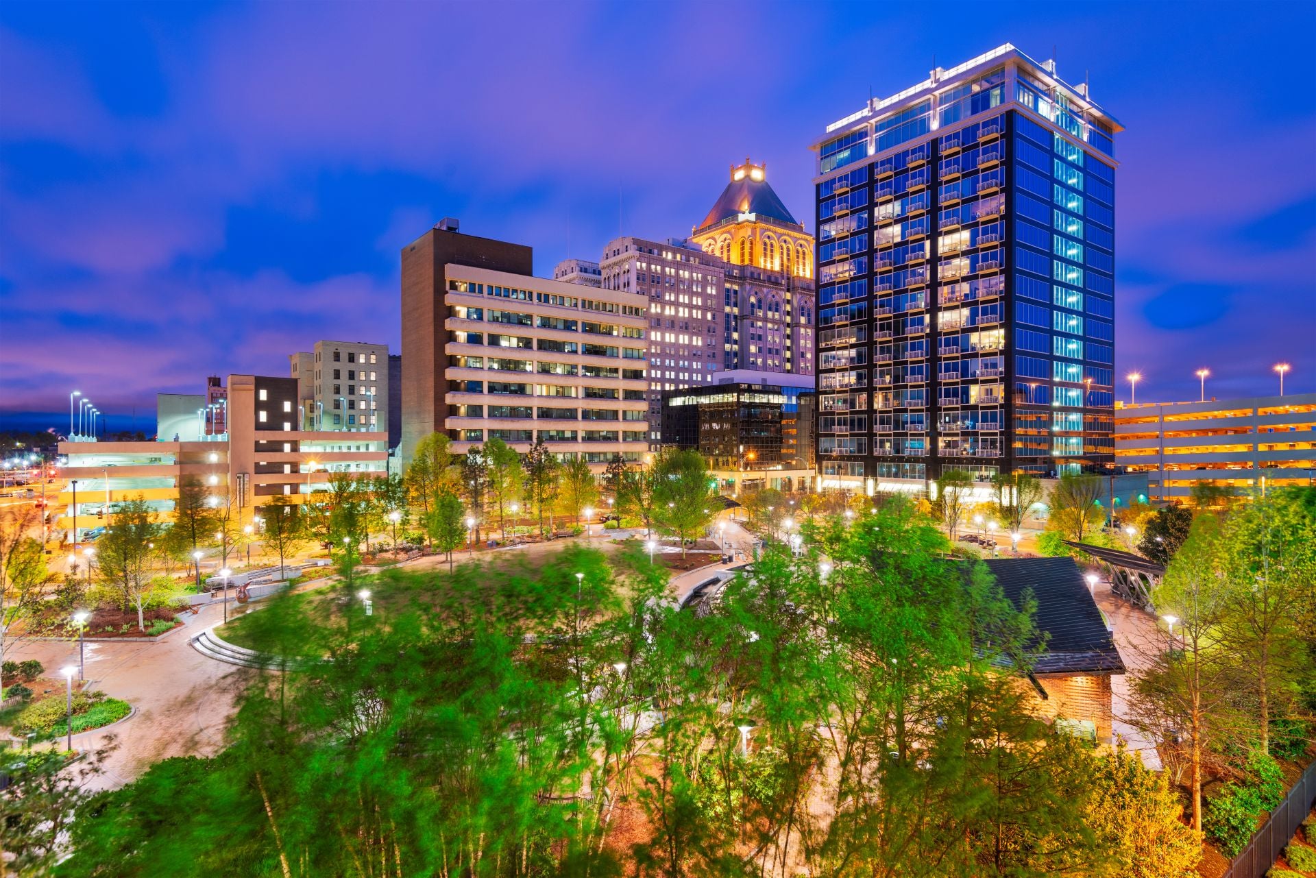 Greensboro, North Carolina, USA downtown city skyline at night.