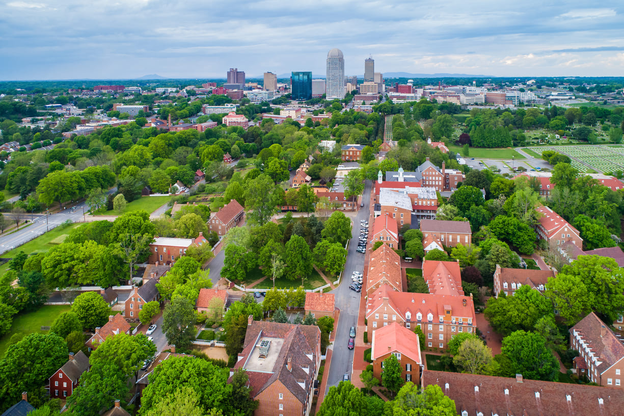 View of Old Salem and downtown Winston-Salem, North Carolina.