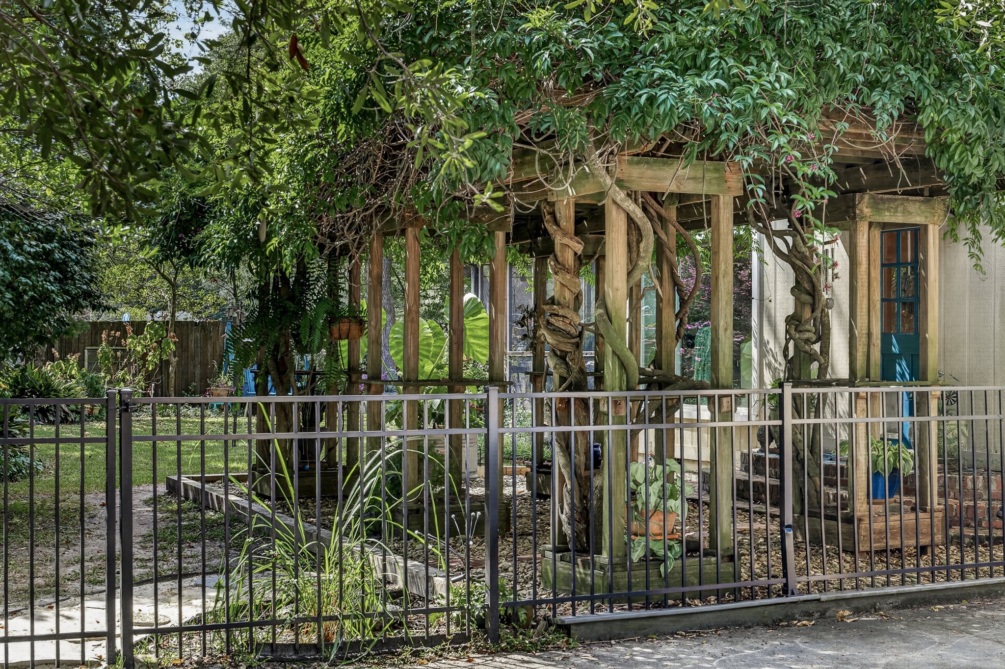 Wrought-iron garden gate at 500 Orange St, Georgetown SC