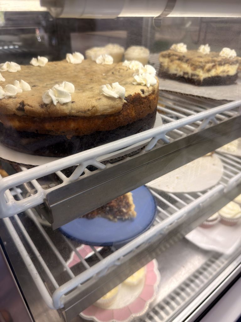 Cakes and cheesecakes in the case at Indigo Bakery, Georgetown SC