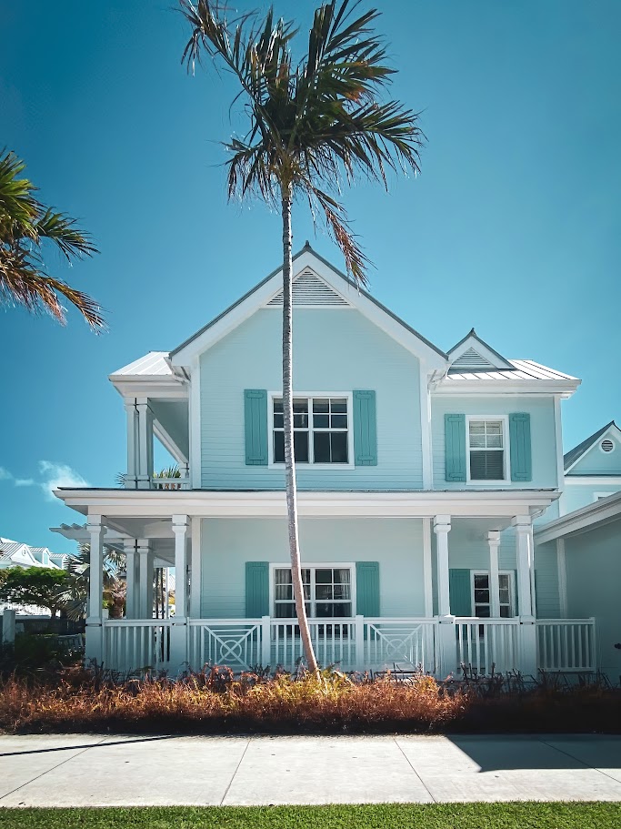 Picturesque house with palm trees