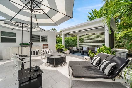 Firepit and screened cabana on patio pool patio at 3481 NE 18th Avenue Oakland Park FL