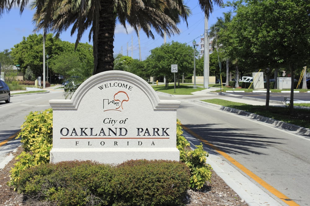 Oakland,Park,,Florida,-,May,7,,2013:,Cement,Sign,With