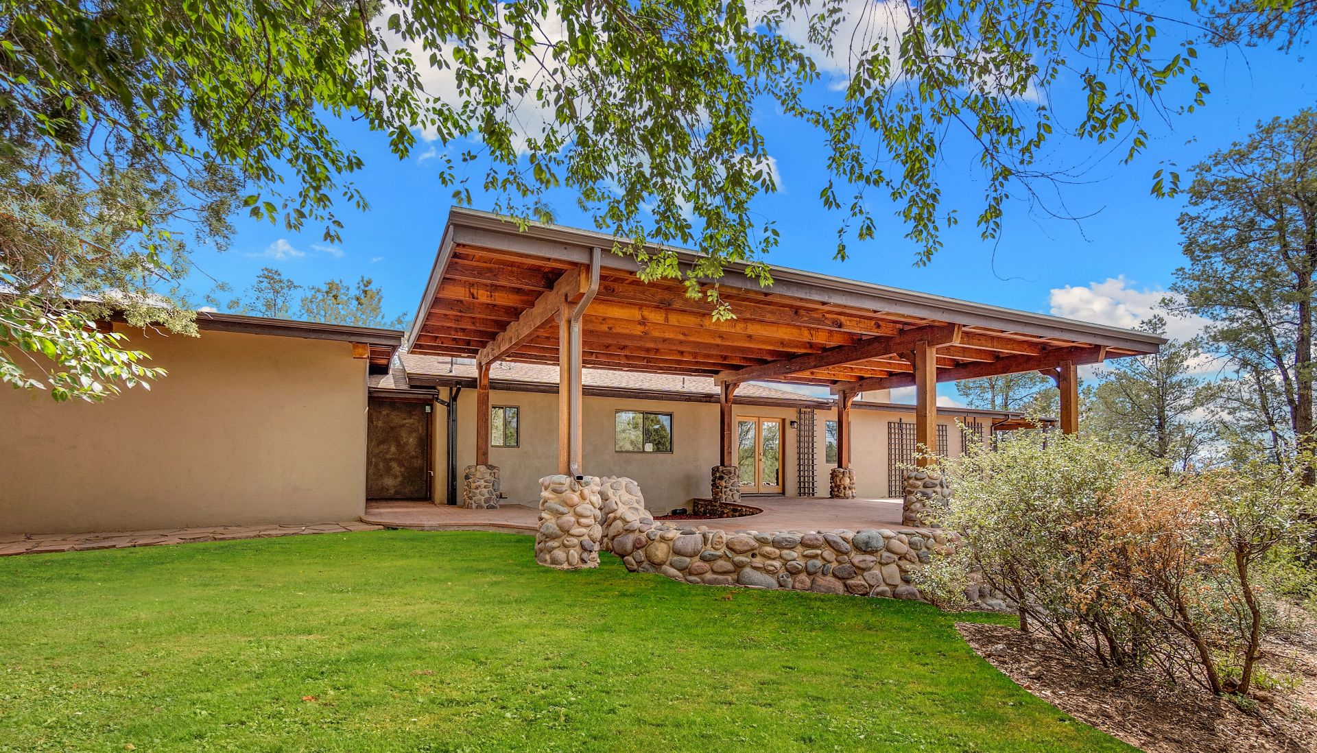 A Home backyard with a patio . High quality photo
