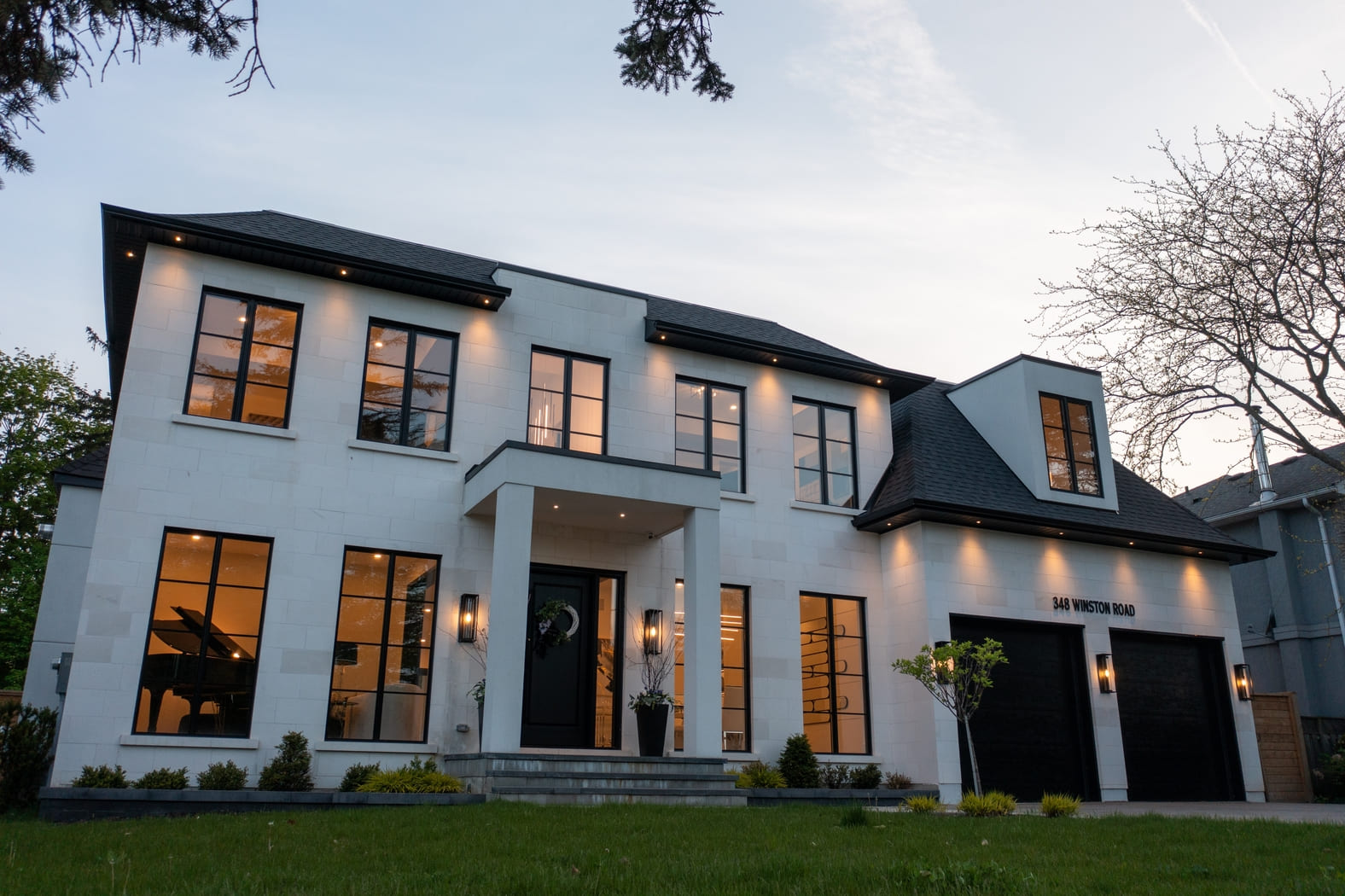 Showcase the beauty of million-dollar luxury homes at twilight with these stunning photos. Perfect for real estate, architecture, and design, highlighting the elegance and allure of night-time (1)