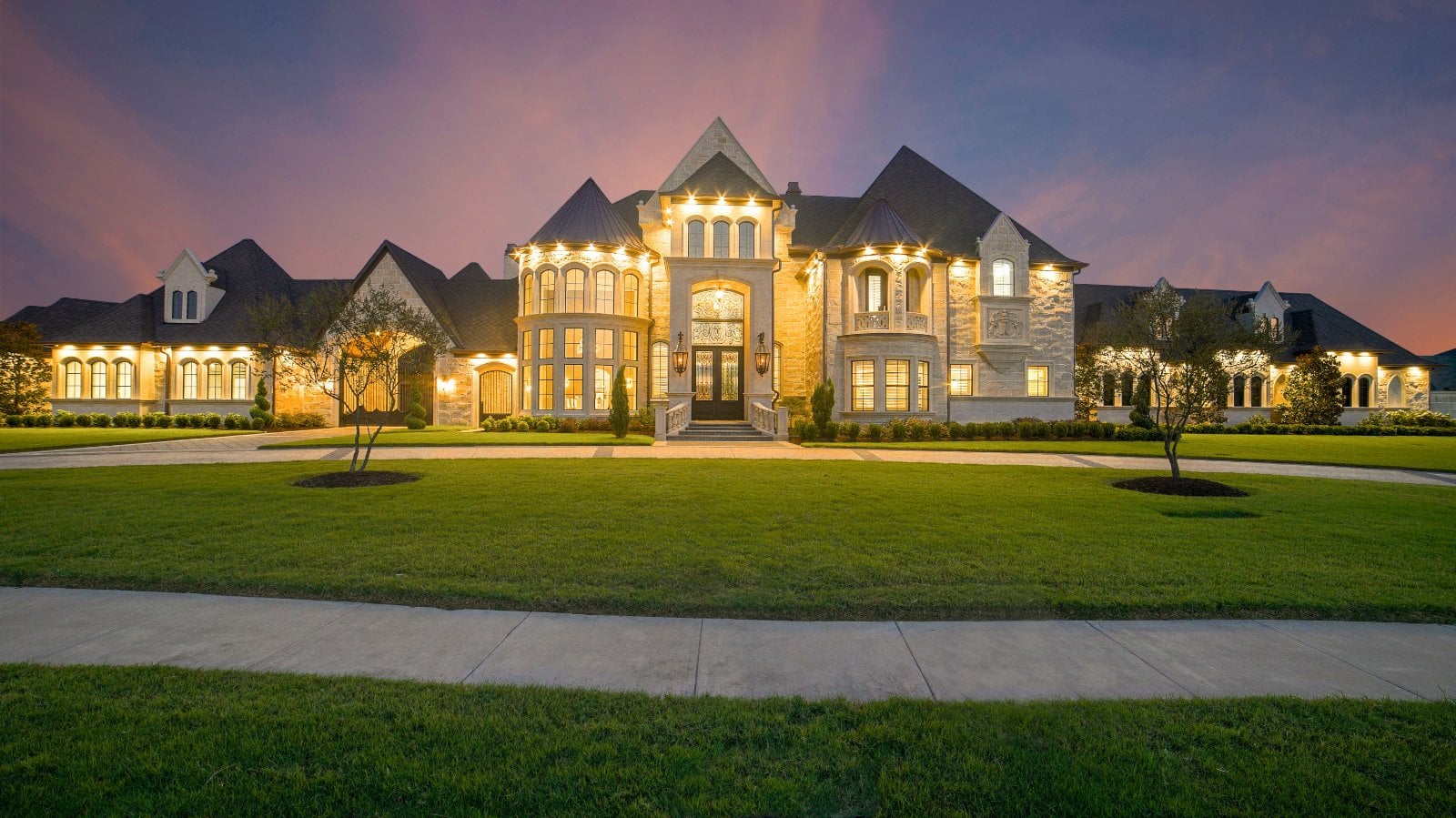 Contemporary luxury estate home at dusk