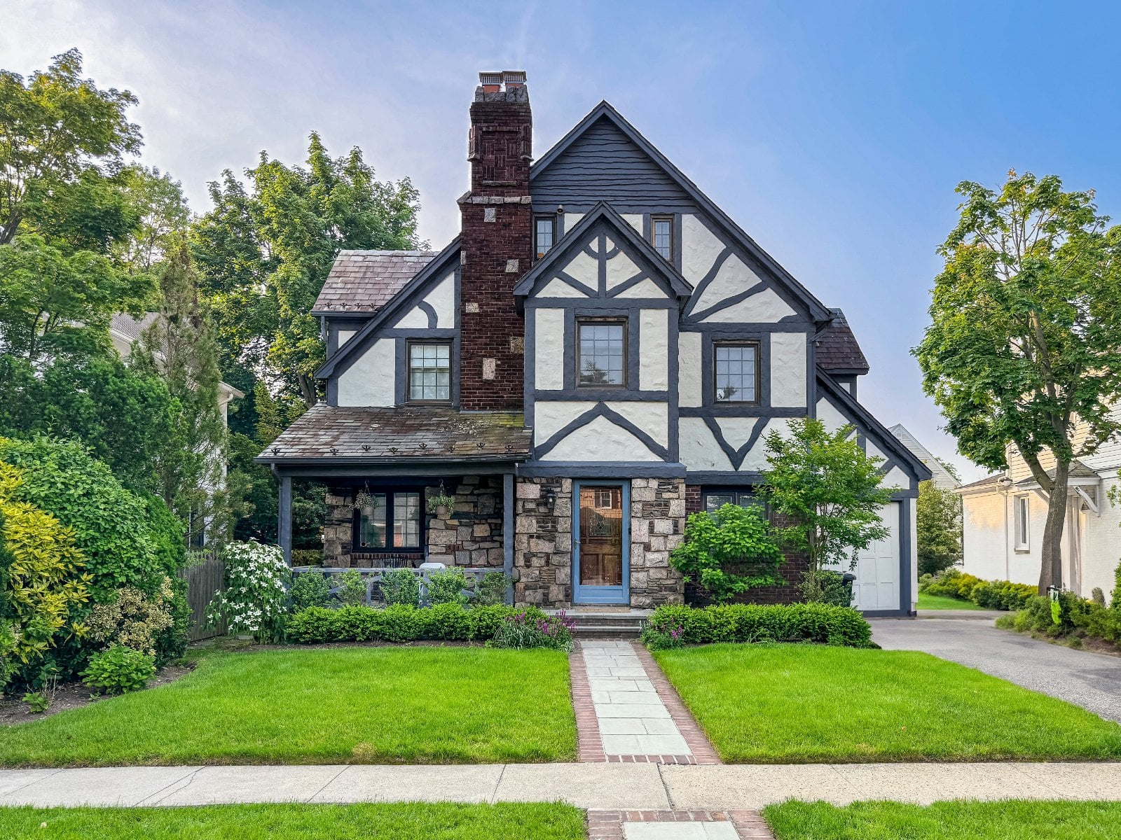 Tudor Revival home with half-timbering and steep gables