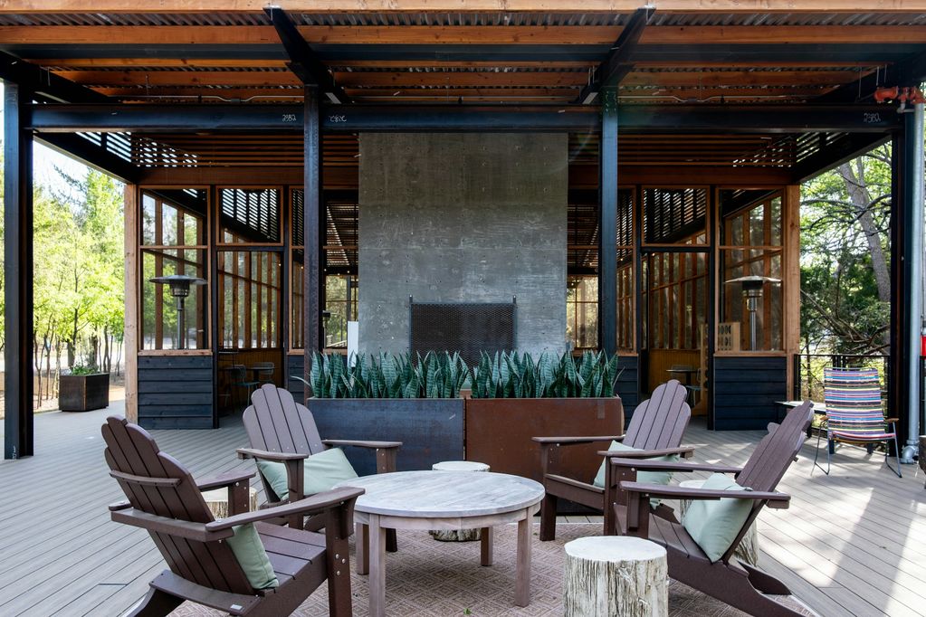 Covered terrace with outdoor fireplace