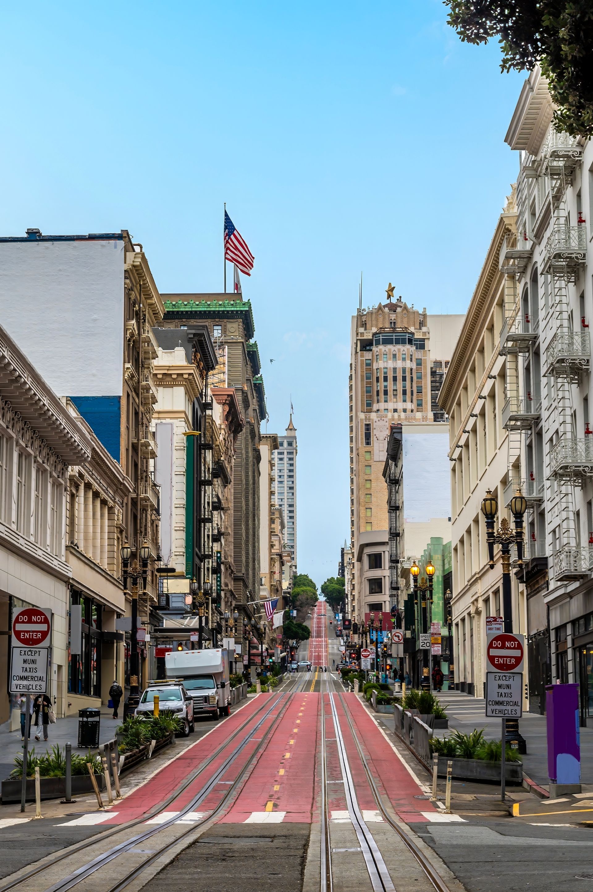 A view up the steep section of Powell Street in the early evening in San Francisco in early springtime