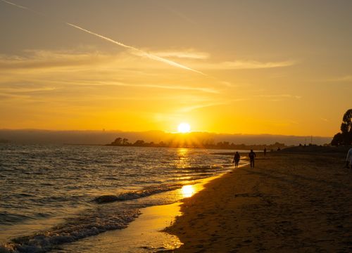 A beautiful sunset during summer at a beach in Alameda Ca