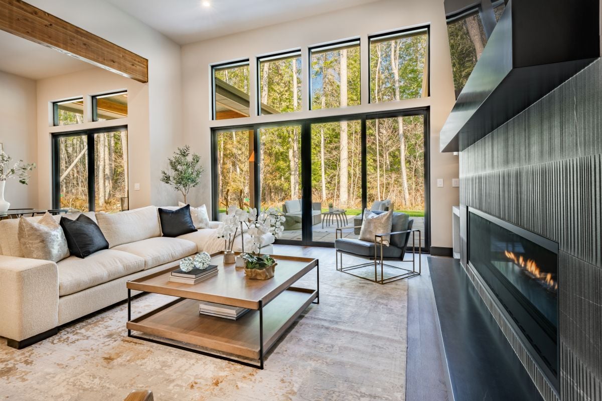 walk in closet and laundry room with staging and stainless appliances deep sink grey cabinets