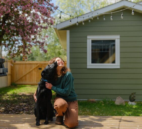 Woman and dog on patio (1)