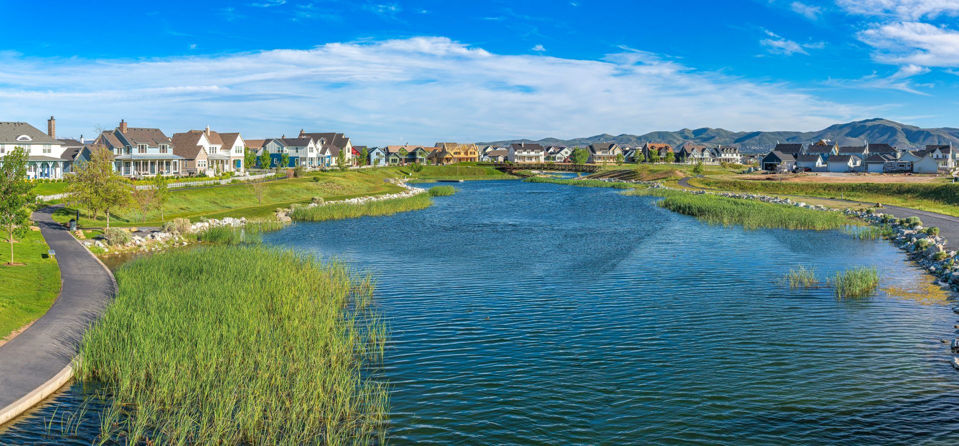 Oquirrh Lake at Daybreak in Utah with paved sidewalk on the side