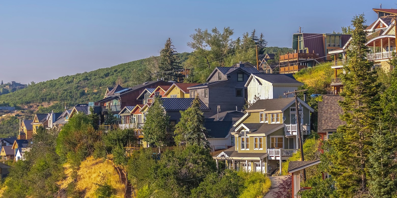 Homes in the sunset light Park City Utah pano