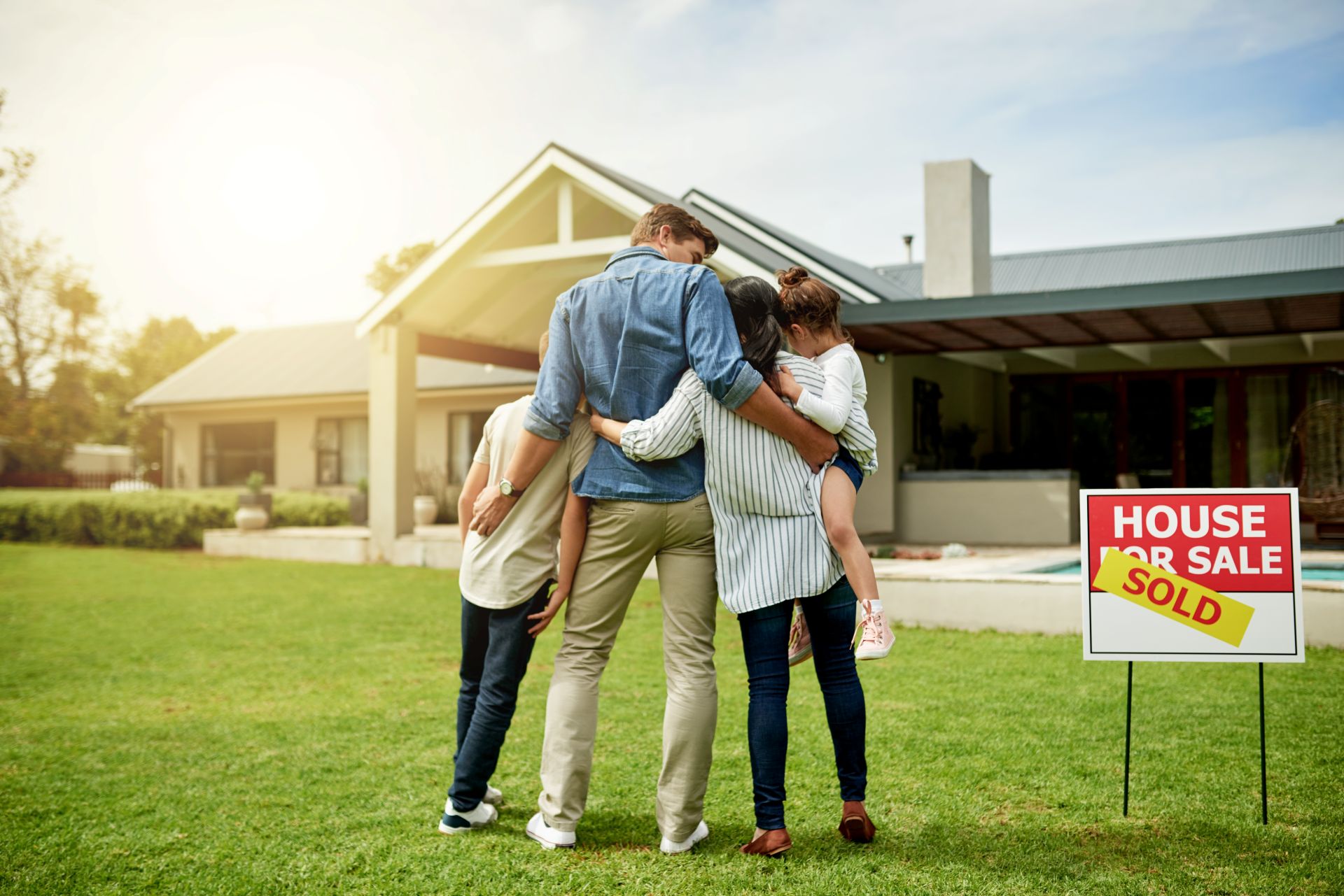 Purchase, hug and parents with children, new home and milestone for homeowner with property and yard. Outdoor, sold and back for relocation to house,