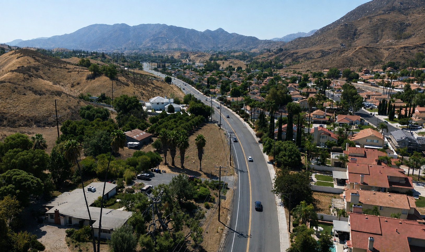 Aerial view of homes and hills in Reche Canyon near Colton California