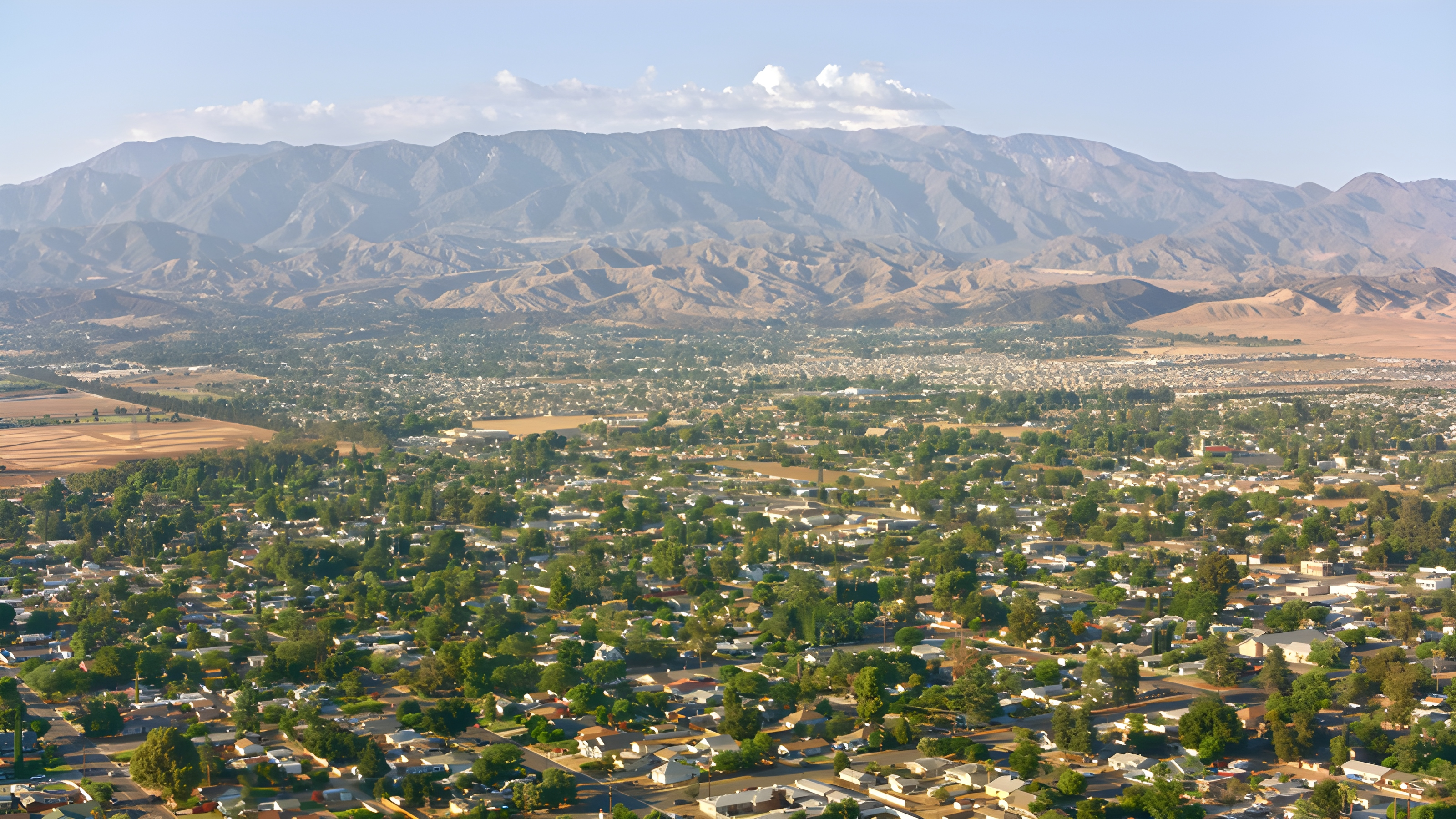 Aerial view of Beaumont California neighborhoods with mountains surrounding the San Gorgonio Pass
