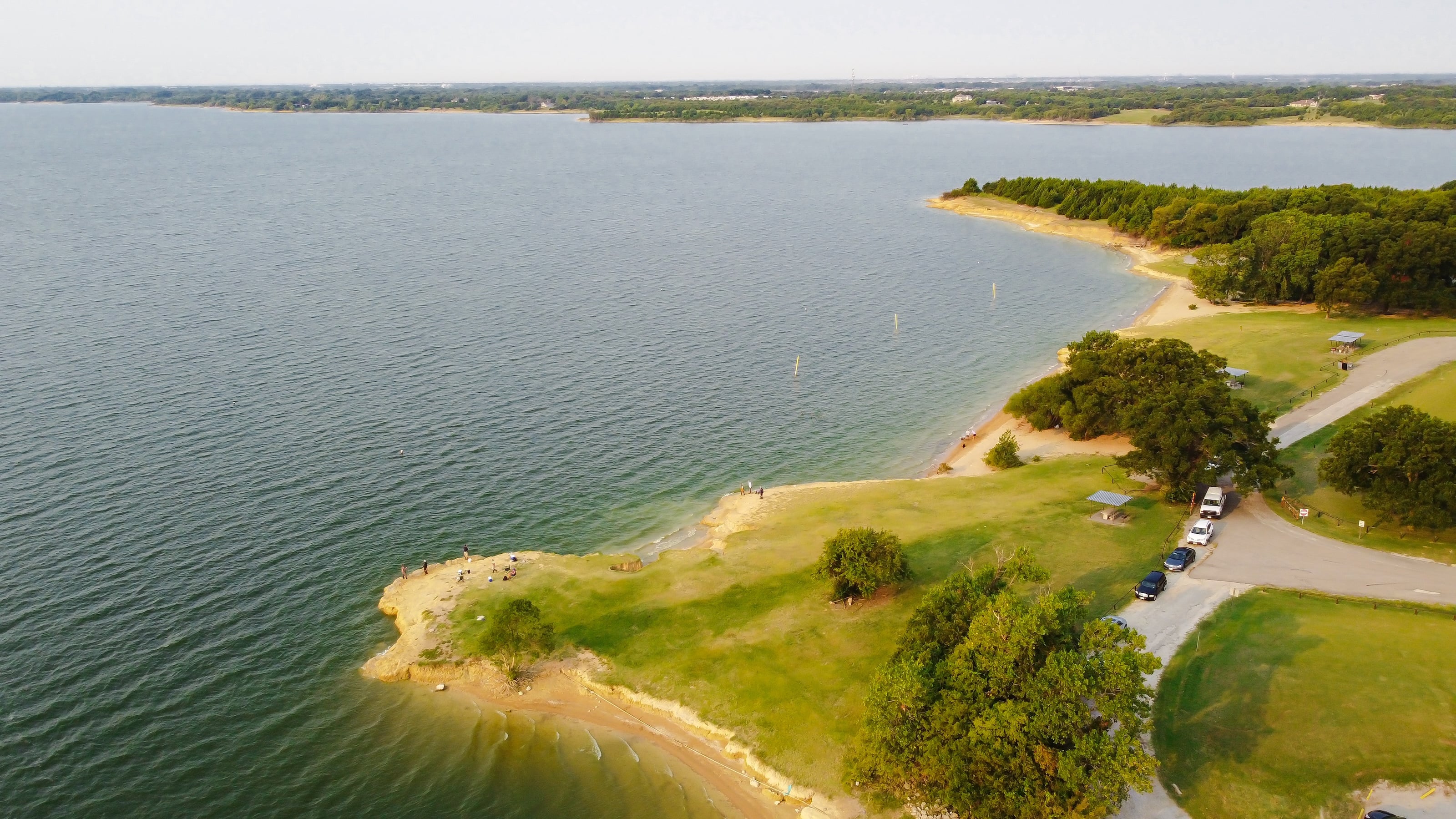 Aerial view of a sandy beach and shoreline park on Lake Lavon near Wylie, Texas