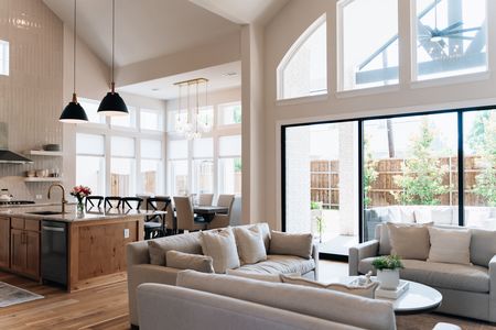 Bright living room with vaulted wood-beamed ceiling, alongside "Real Estate Photoshoot Checklist" heading