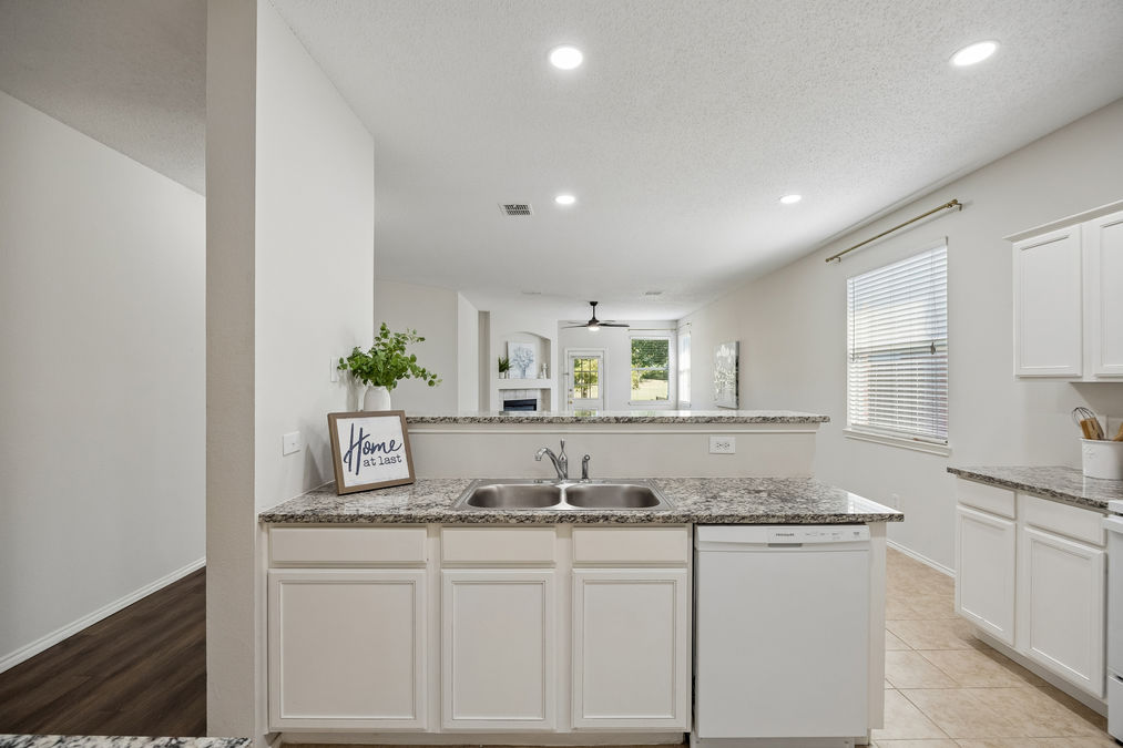 10617 Gleneagles Lane kitchen opens to family room
