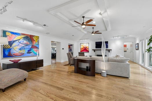 Living room with tray ceiling and fireplace | 9020 Glen Springs Dr, Dallas, TX 75243 | Lake Highlands