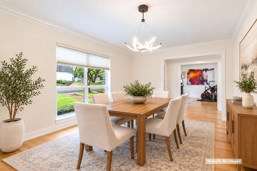 Dining room with chandelier (virtually staged) | 9020 Glen Springs Dr, Dallas, TX 75243 | Lake Highlands