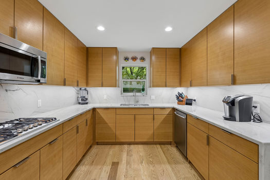 Kitchen with gas cooktop and window over the sink | 9020 Glen Springs Dr, Dallas, TX 75243 | Lake Highlands