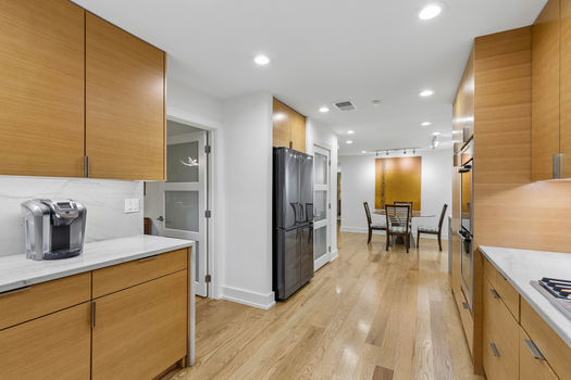 Kitchen opening to the breakfast area | 9020 Glen Springs Dr, Dallas, TX 75243 | Lake Highlands