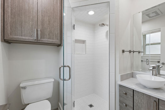 Bathroom with frameless glass shower | 9020 Glen Springs Dr, Dallas, TX 75243 | Lake Highlands