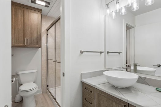 Bathroom with vessel sink and glass shower | 9020 Glen Springs Dr, Dallas, TX 75243 | Lake Highlands