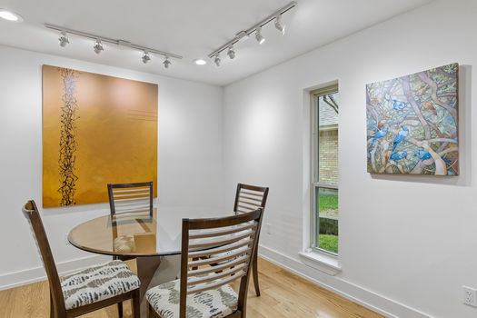 Breakfast area with track lighting and side window | 9020 Glen Springs Dr, Dallas, TX 75243 | Lake Highlands