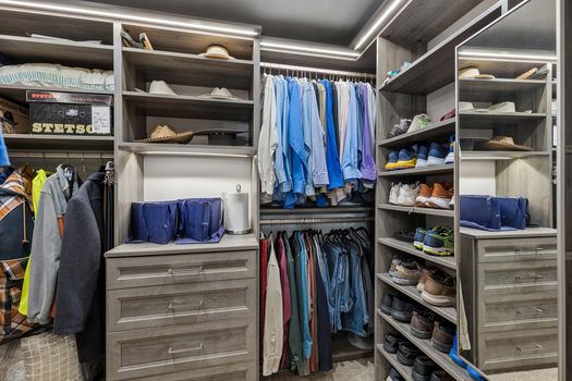 Primary closet with custom built-ins | 9020 Glen Springs Dr, Dallas, TX 75243 | Lake Highlands