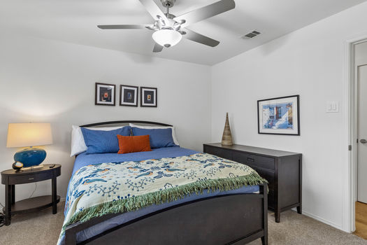 Bedroom with ceiling fan and carpet | 9020 Glen Springs Dr, Dallas, TX 75243 | Lake Highlands