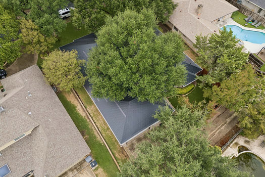 Aerial view of lot and turf backyard | 9020 Glen Springs Dr, Dallas, TX 75243 | Lake Highlands