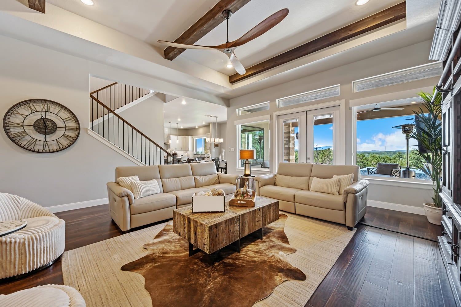 Dallas, Texas - May 27th 2023 a home living room with a stone fireplace 1
